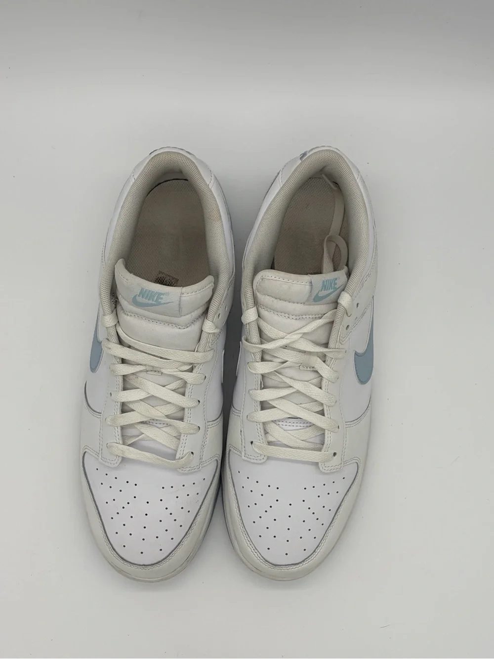 Nike Dunks Men’s Low-Top Sneakers in White with Light Blue Swoosh